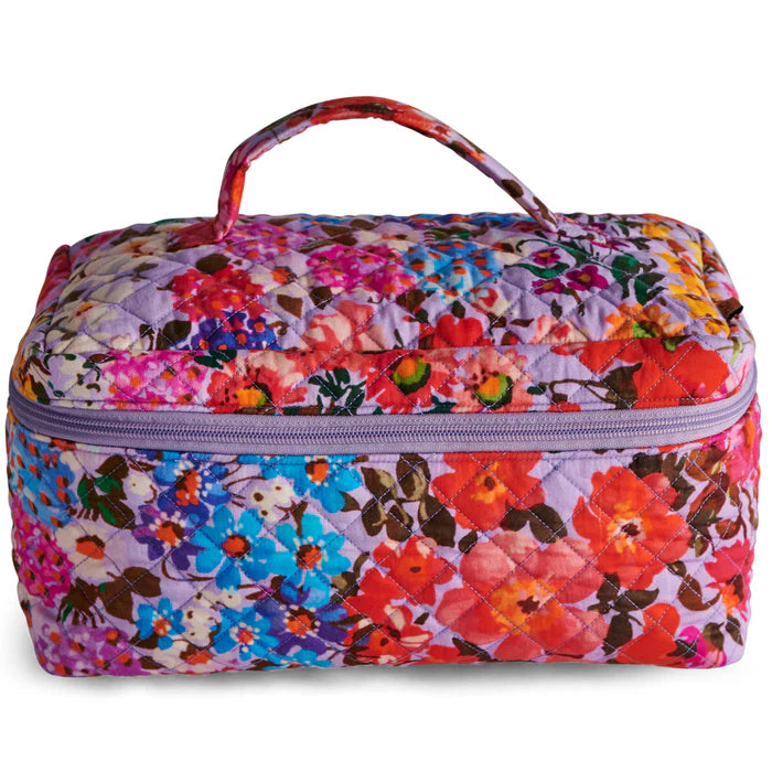 Floral patterned cosmetic bag on a white background
