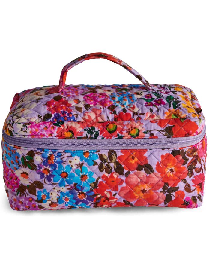 Floral patterned cosmetic bag on a white background
