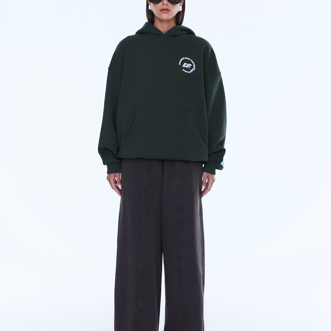 Full body front view of moss green Aries Hoodie with chest logo