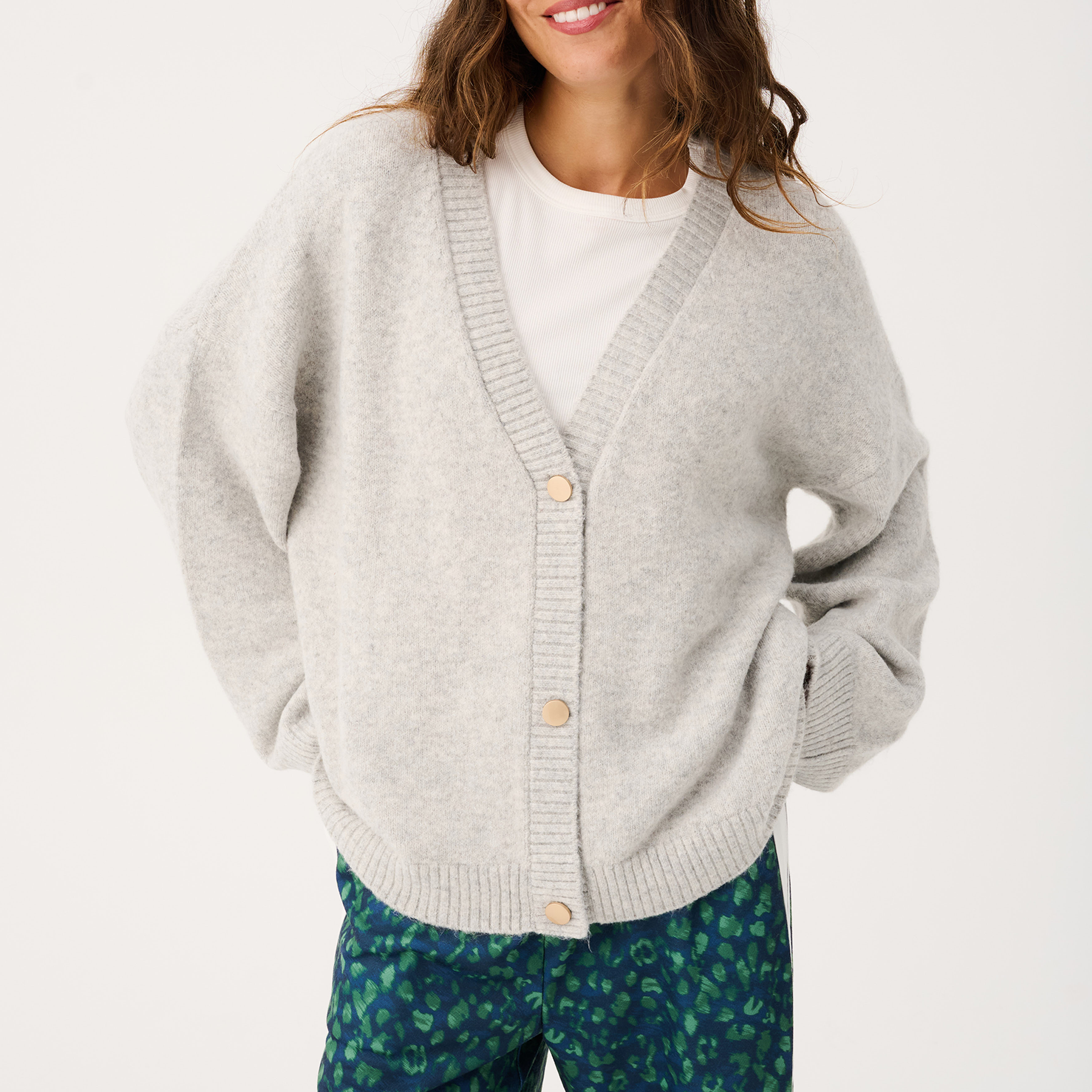 Front view of Adela grey marle knit cardigan with V-neck and button closure styling