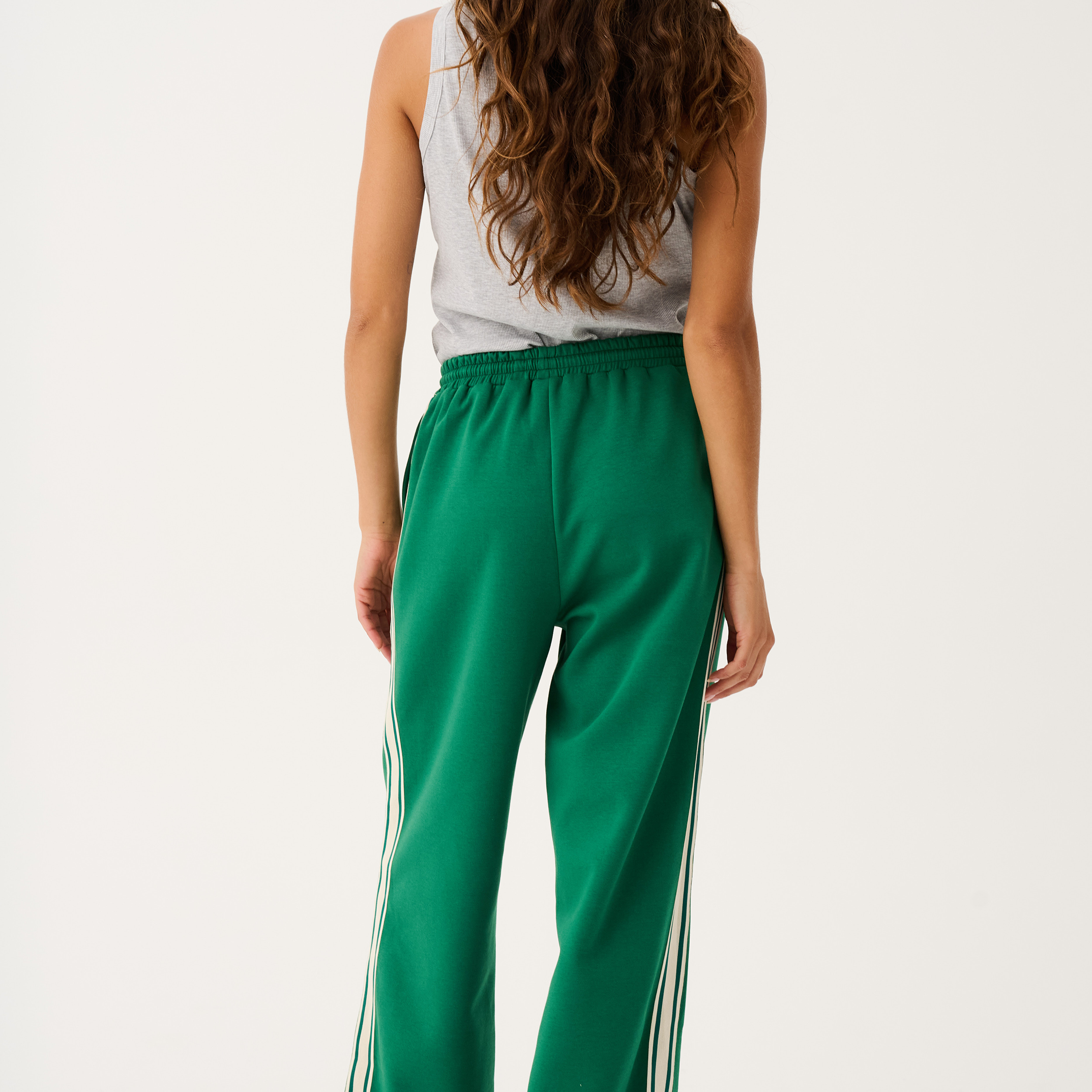 Back view of Adeline Pants showing elastic waistband and white side stripe detailing