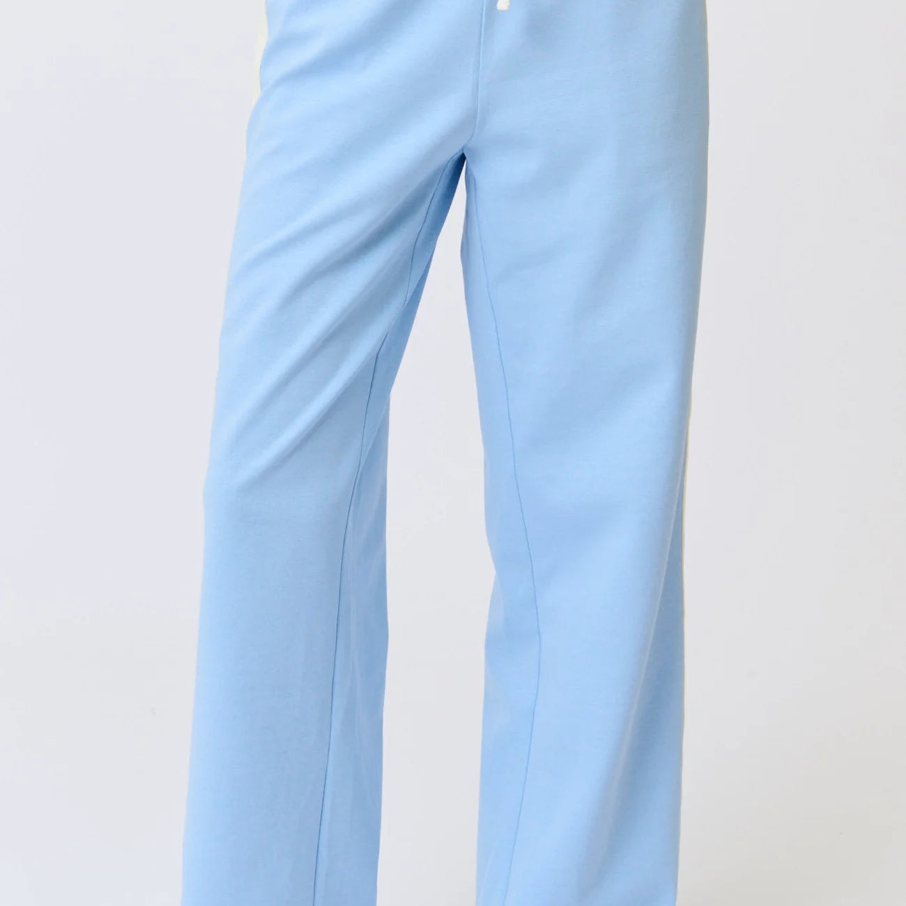 blue pant with white stripe by cartel and willow