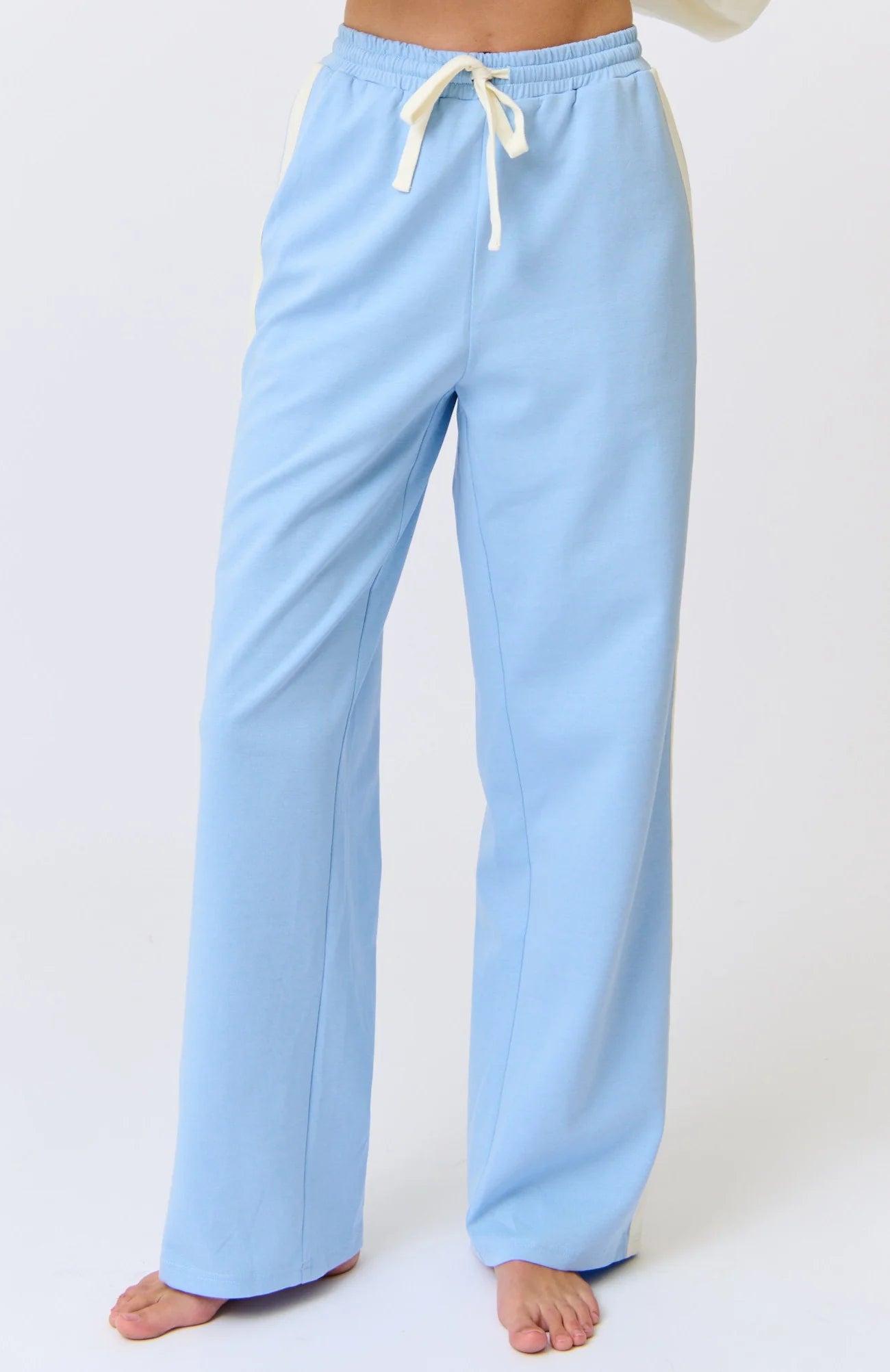 blue pant with white stripe by cartel and willow