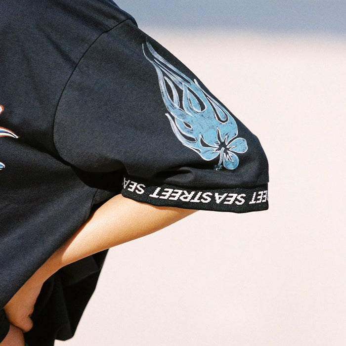 sleeve detail of the washed black Aloha Moto SS T-Shirt by Sea Street