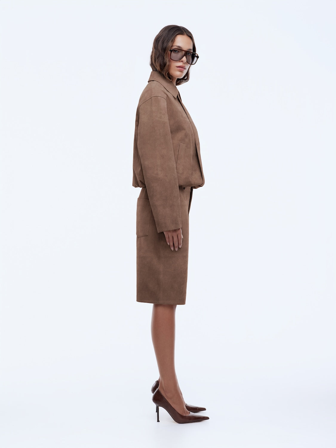 side view of model wearing Ana Suede Bomber by Ena Pelly