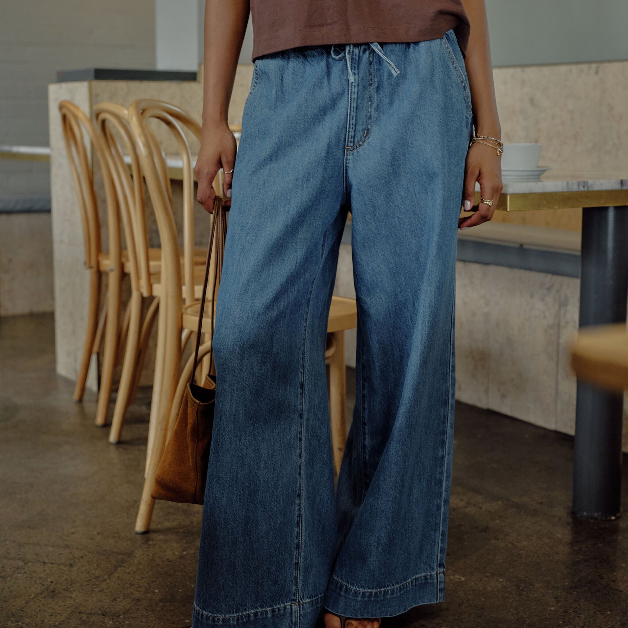 Side view of Andie Wide Leg Drawstring Pant in fresh indigo denim showing relaxed wide leg silhouette
