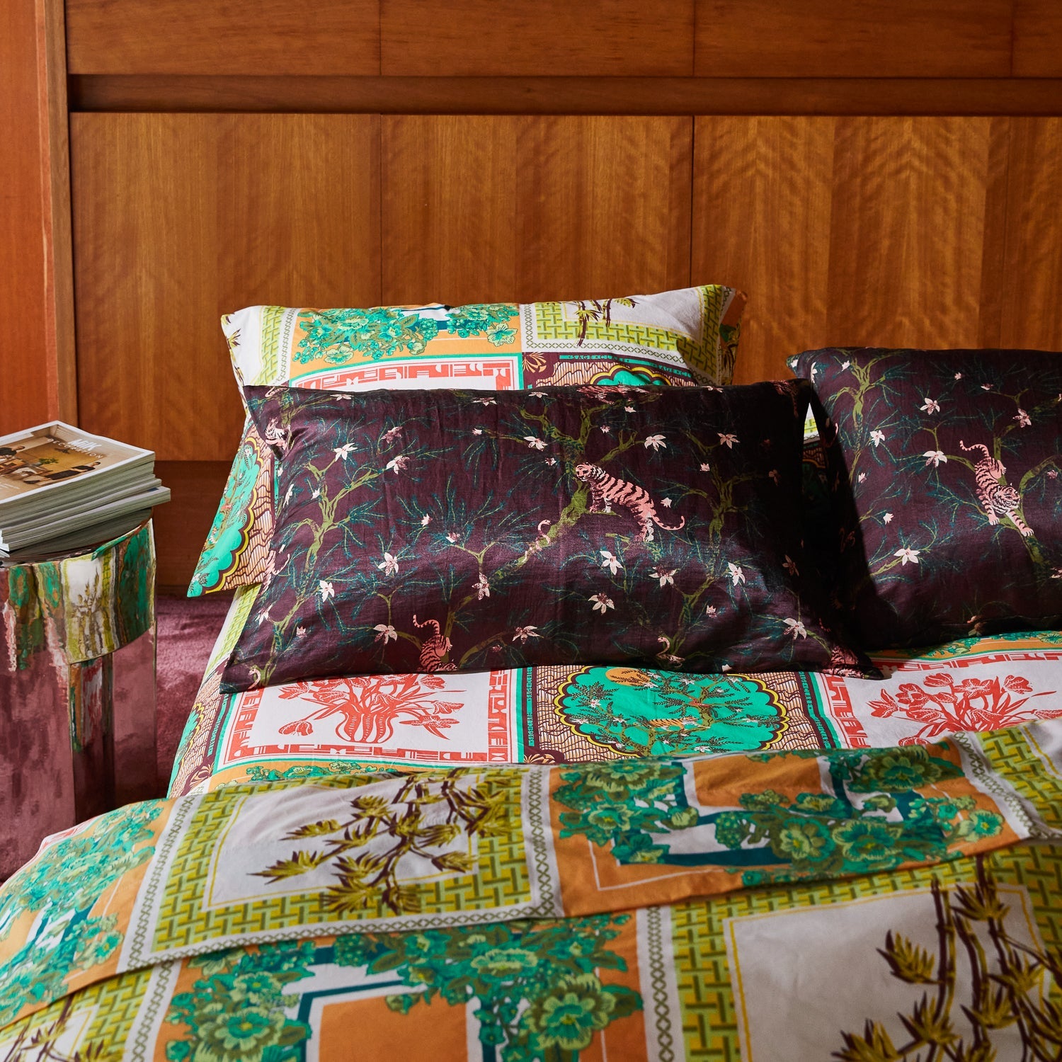 Sage & Clare Andrea pillowcase styled on bed with colorful vintage-inspired scarf print duvet in bedroom setting