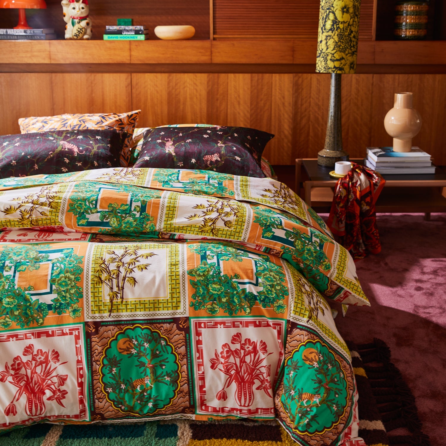 Bedroom styling showing Andrea pillowcase with vintage botanical print duvet on wooden built-in headboard