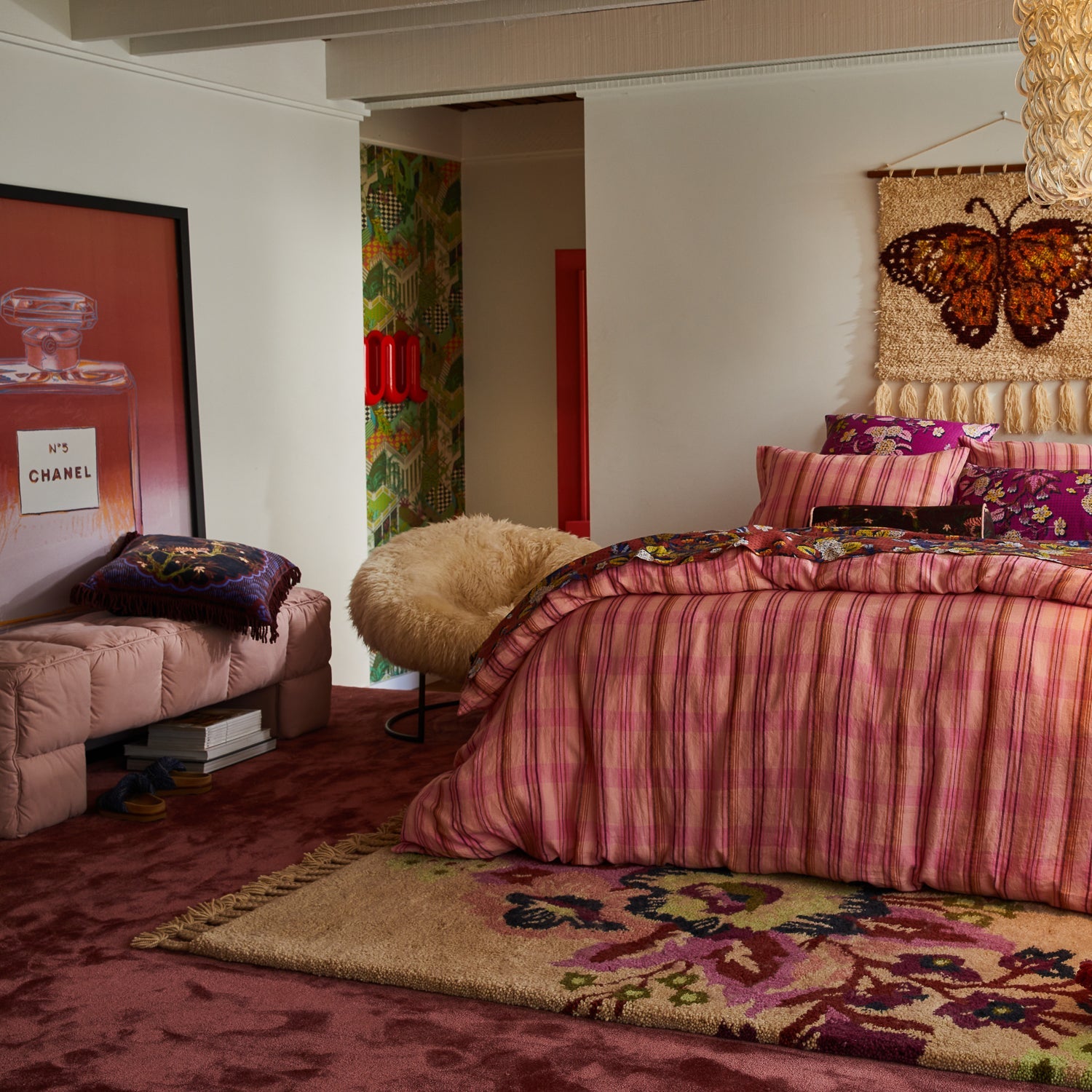 Andrea Velvet Cushion in bedroom setting displaying luxurious velvet texture and statement design