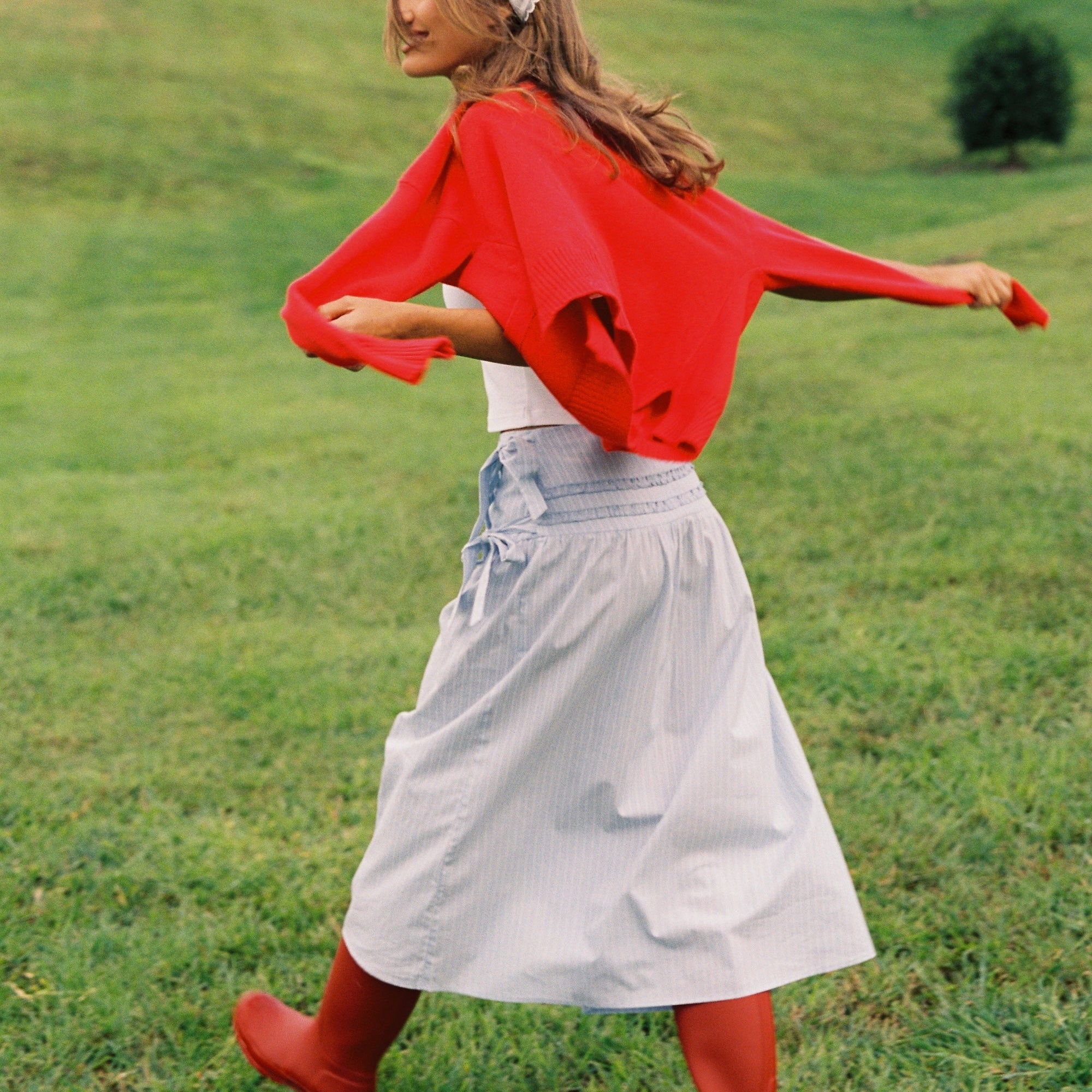 Back view of Annika Midi Skirt displaying gathered waistband and flowing silhouette