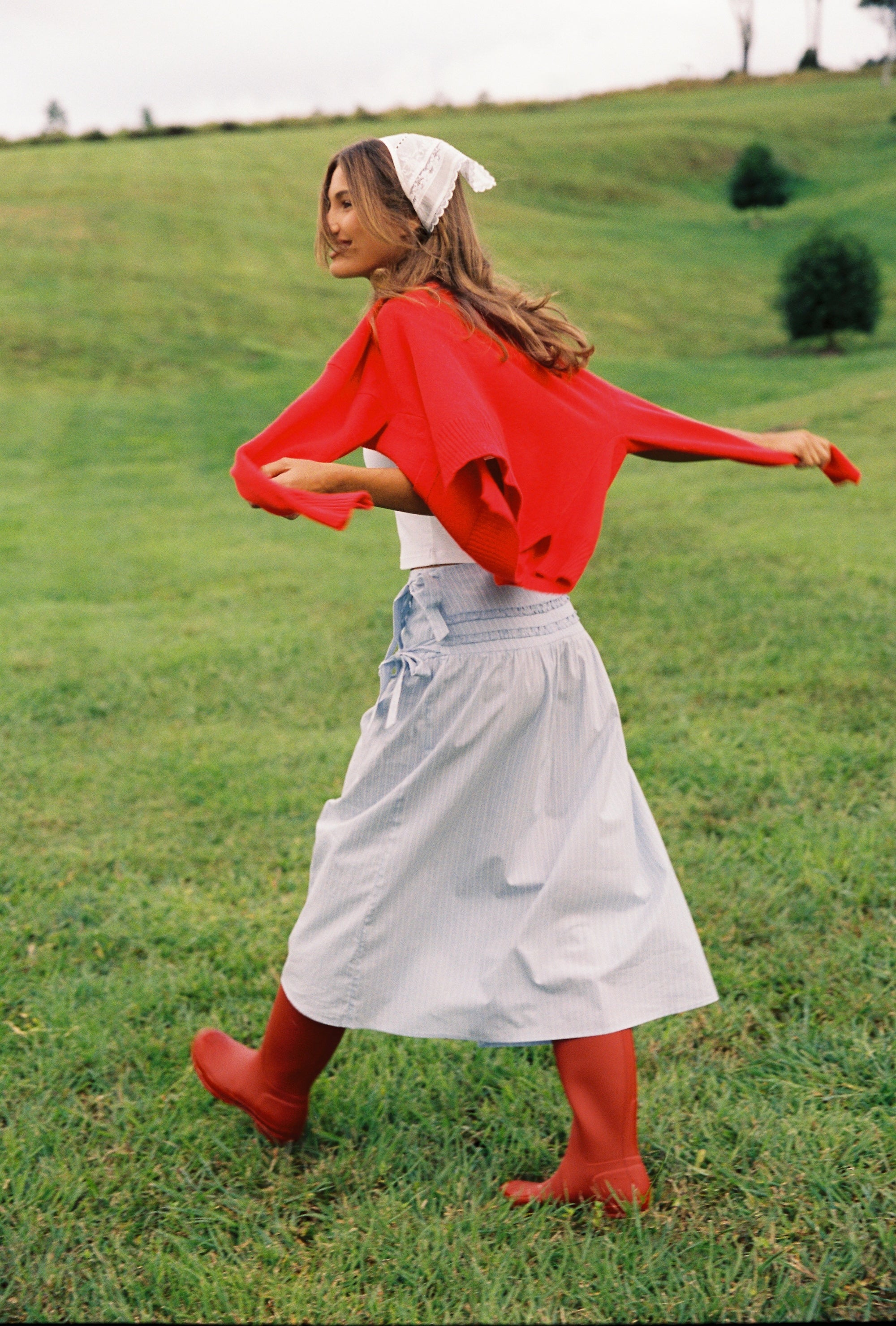Back view of Annika Midi Skirt displaying gathered waistband and flowing silhouette