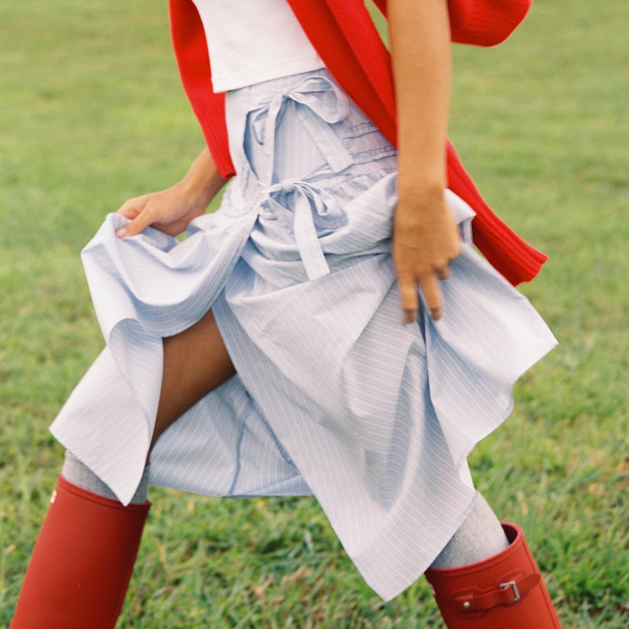 Close-up of Annika Midi Skirt showing wrap tie closure and flowing movement