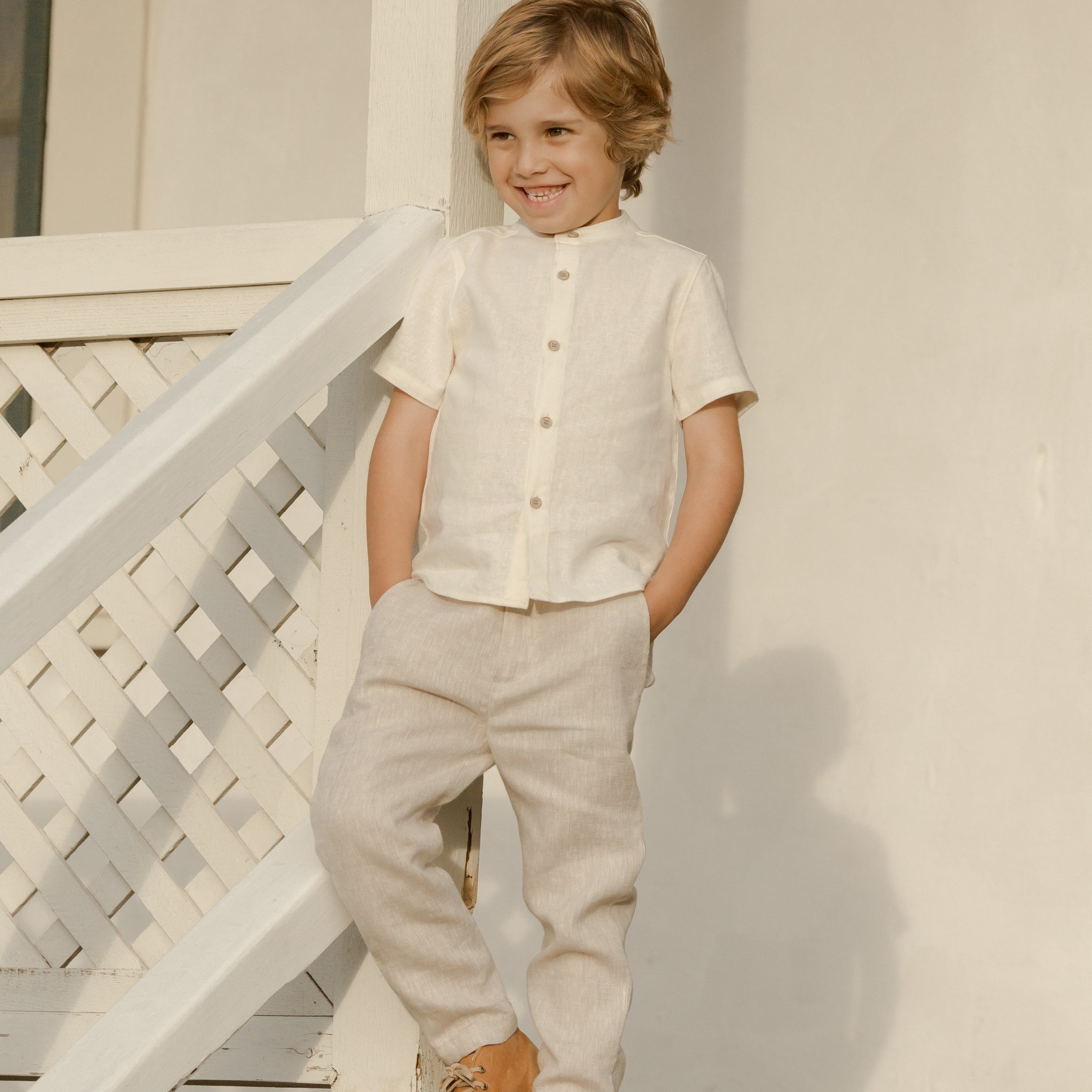Young boy wearing the Archie Shirt Ivory | Noralee