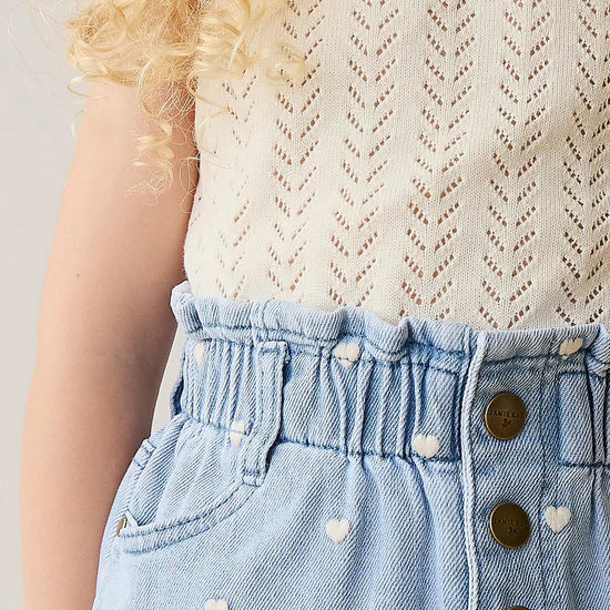 Close up detail of model wearing Aria Knitted Singlet Parchment by Jamie Kay