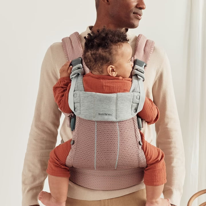 Dad using Baby Bjorn Baby Carrier Harmony 3D Dusty Pink