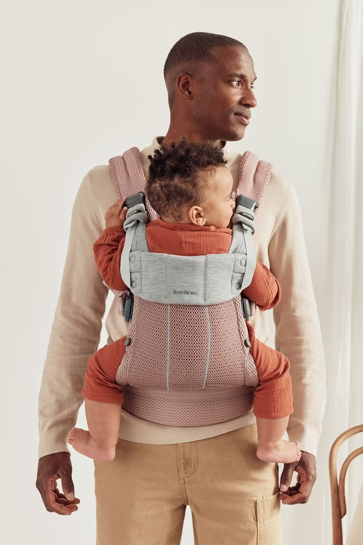 Dad using Baby Bjorn Baby Carrier Harmony 3D Dusty Pink