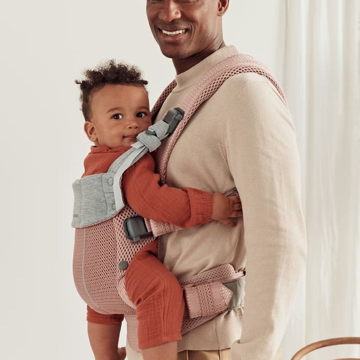 Comforable baby carrier in pink colour