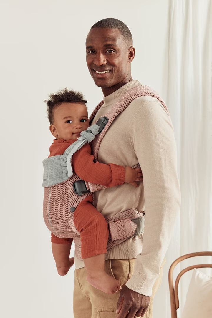 Comforable baby carrier in pink colour
