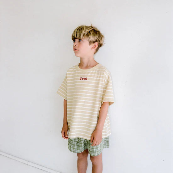 boys green check shorts by Juni