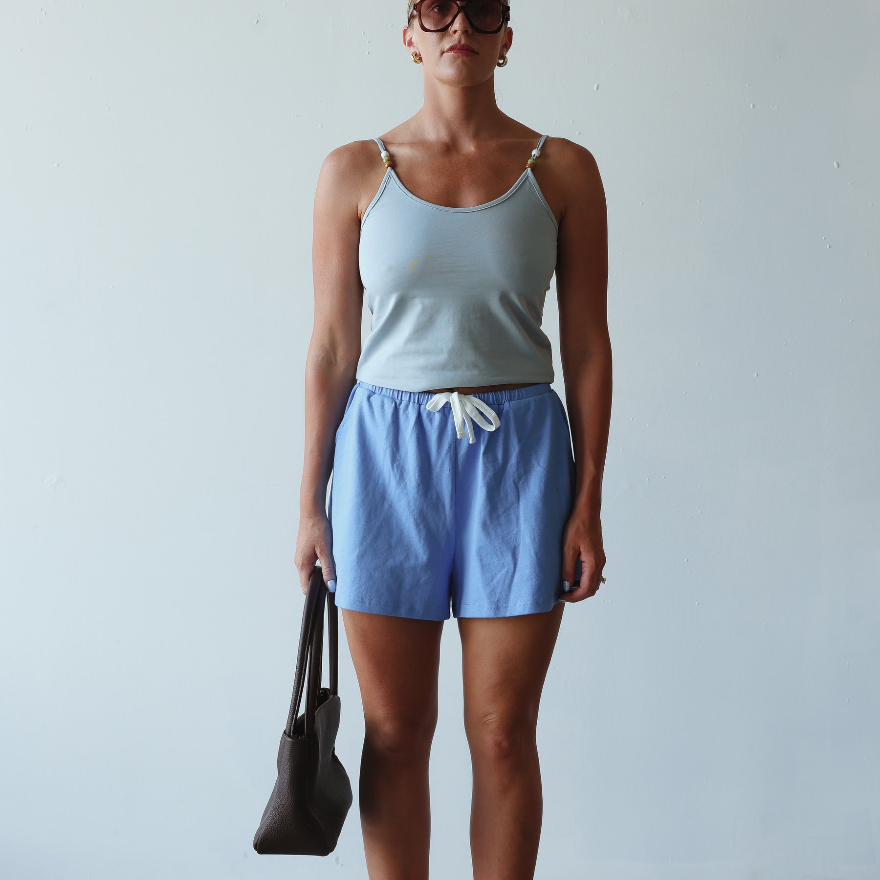 Model wearing Bead Tank - Cornflower by By Billie