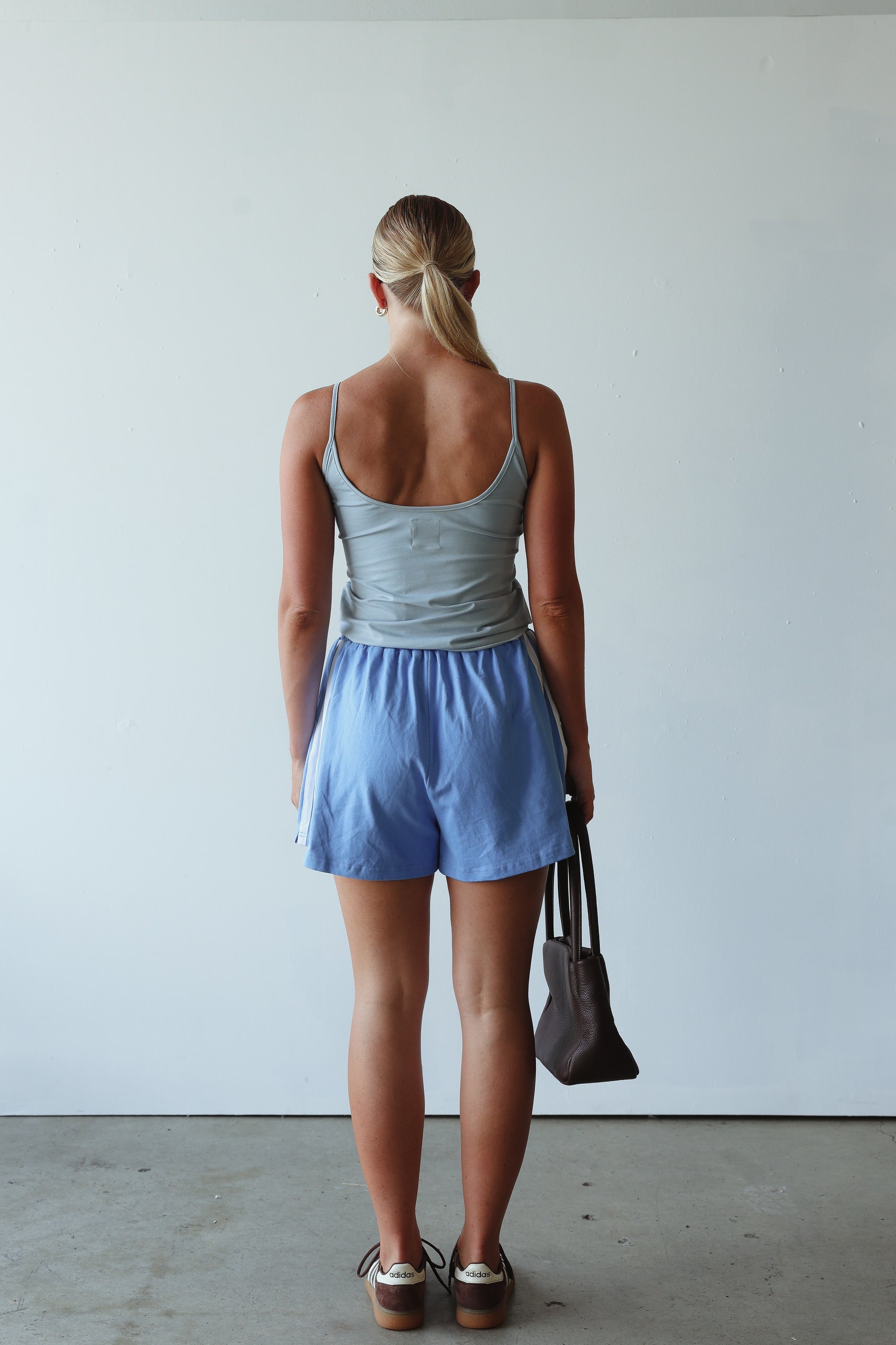 back view of model wearing Bead Tank - Cornflower by By Billie