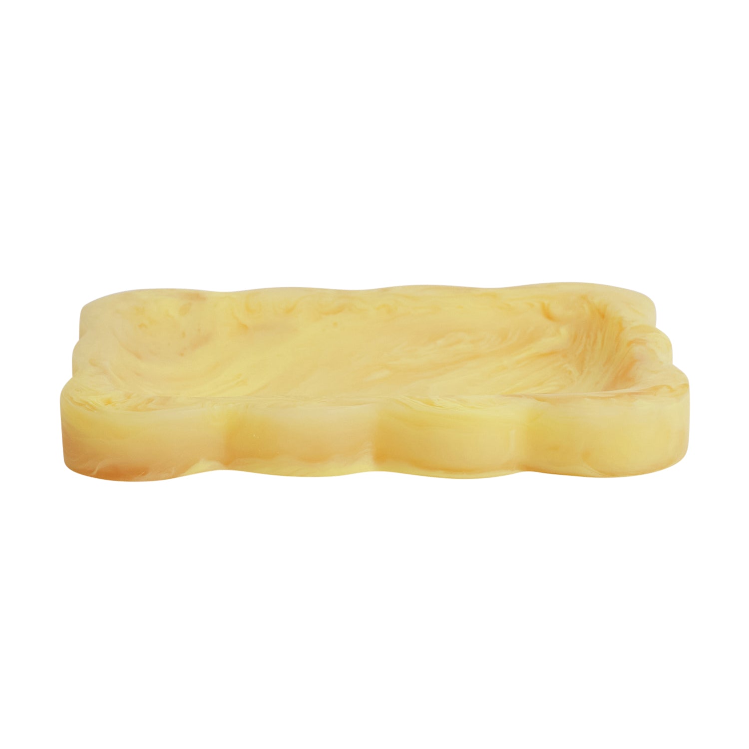 Aspen Gold yellow marbled resin small tray with scalloped wavy border, angled side view on white background