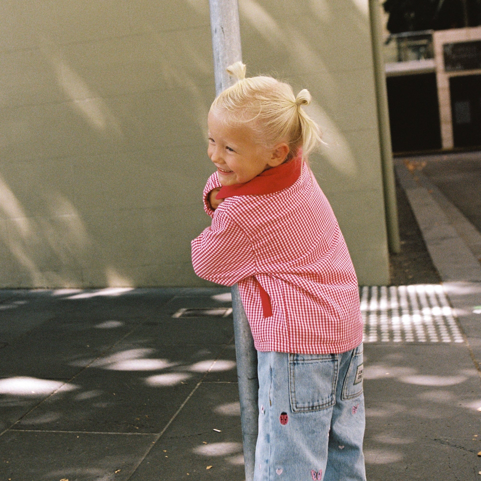girl wearing Blair Jean Garden Embroidery by Juni