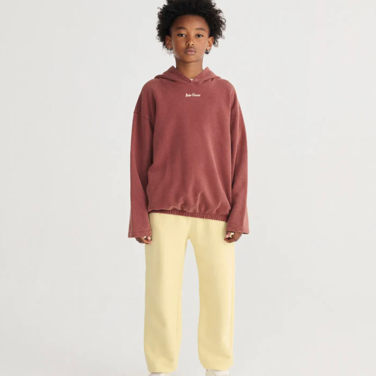 Boy in Bobo Choses Jogging Pants - Yellow | Bobo Choses