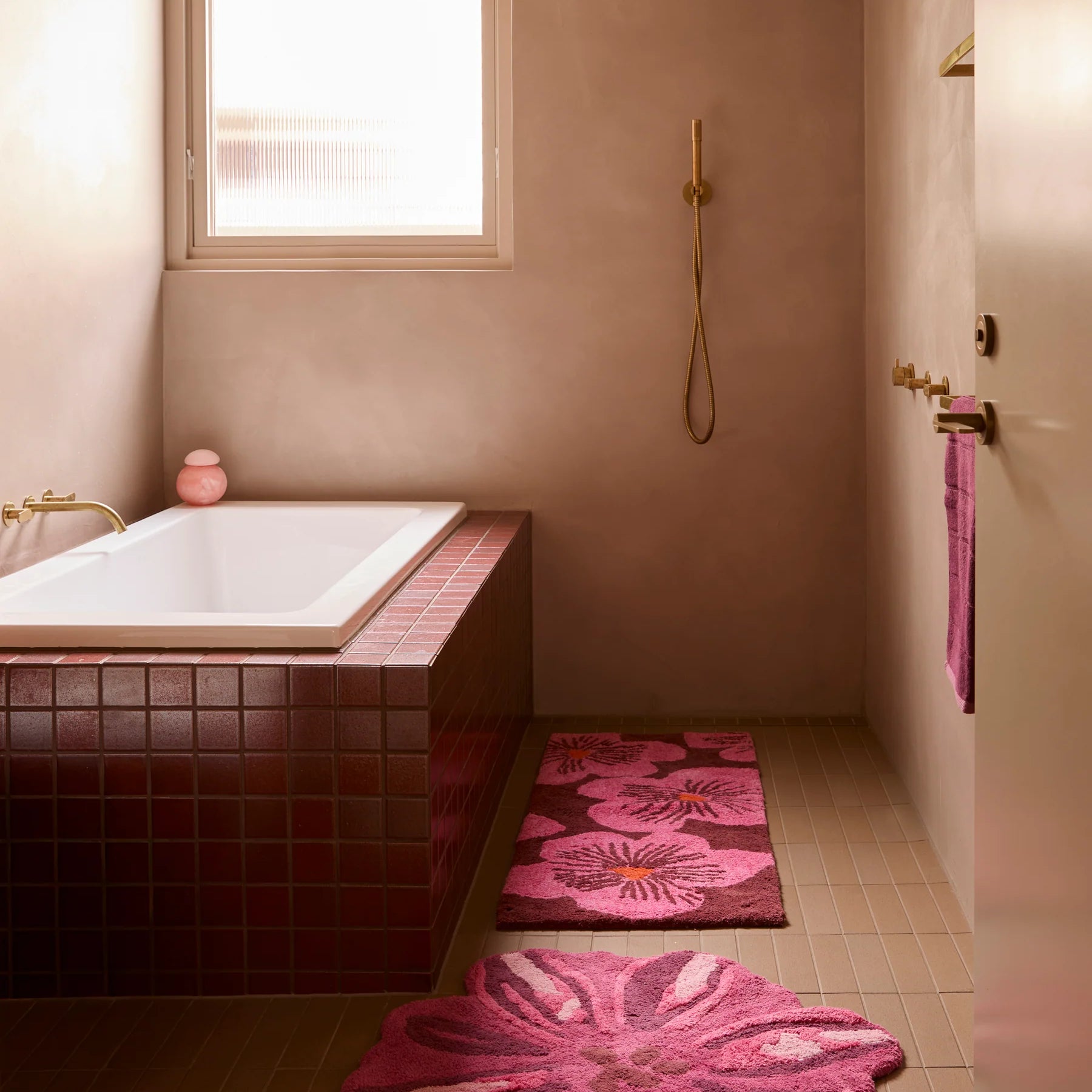 Jardin Pink Long Bath Mat by Bonnie & Neil display on bathroom floor