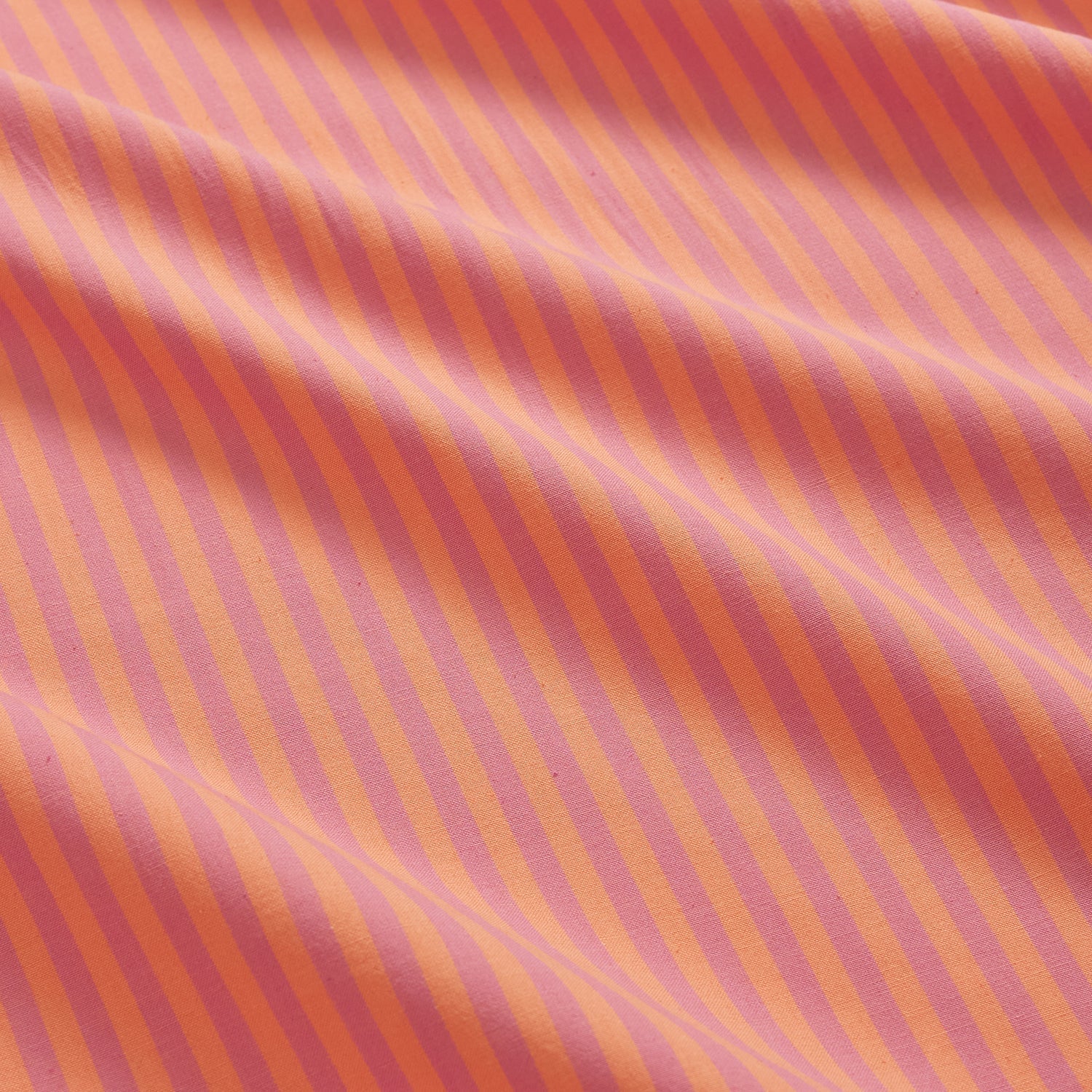 pink and orange striped sheets from sage and Clare