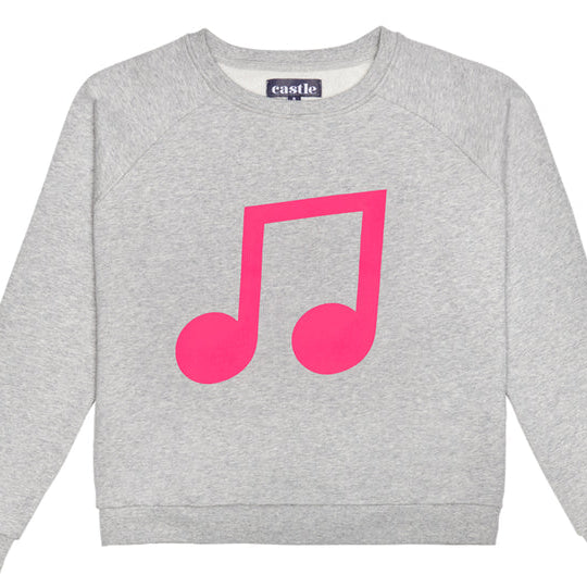 Pink musical note on grey sweater
