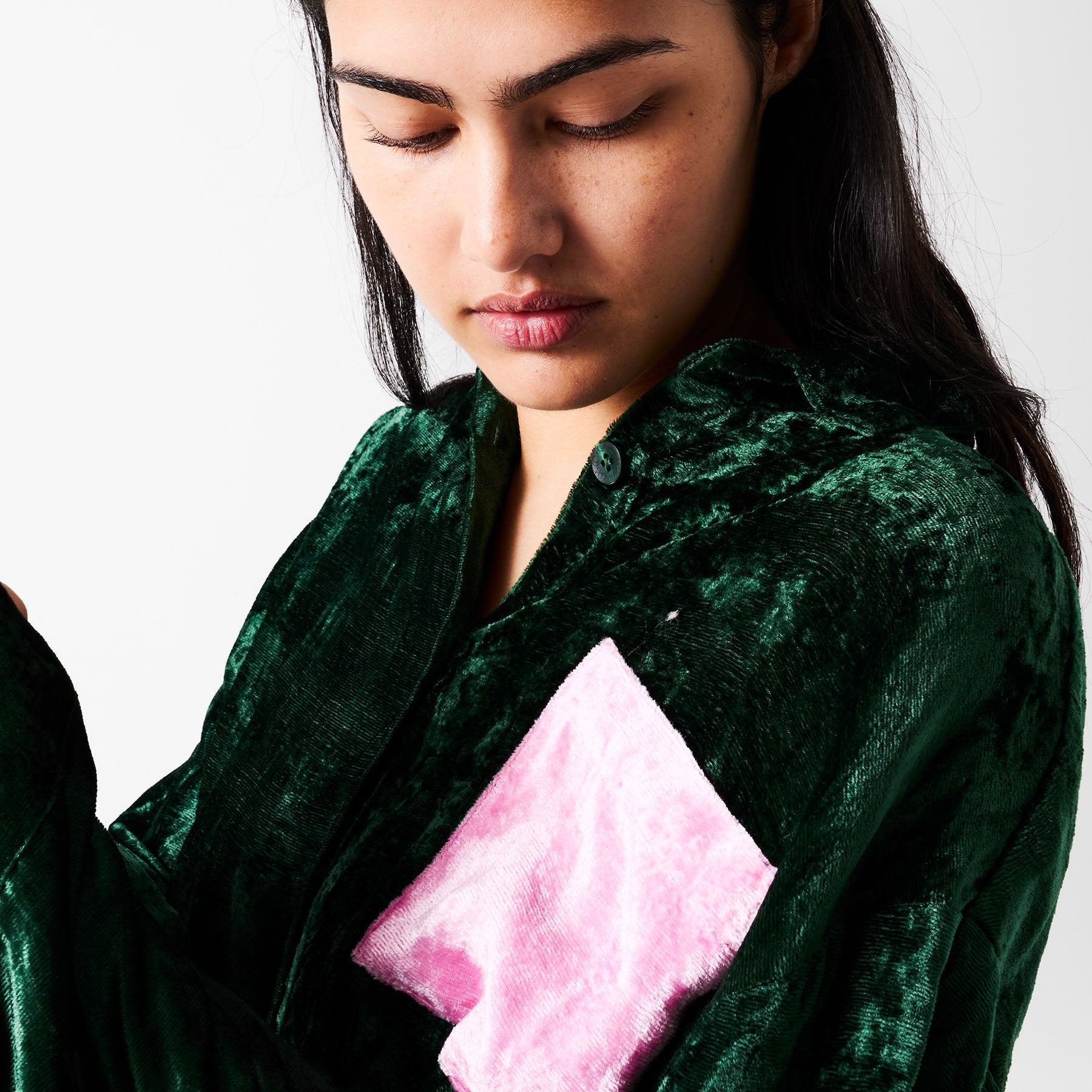 Close-up detail of pink pocket on Candy Pine Adult Velvet Long Sleeve Shirt by Kip Co