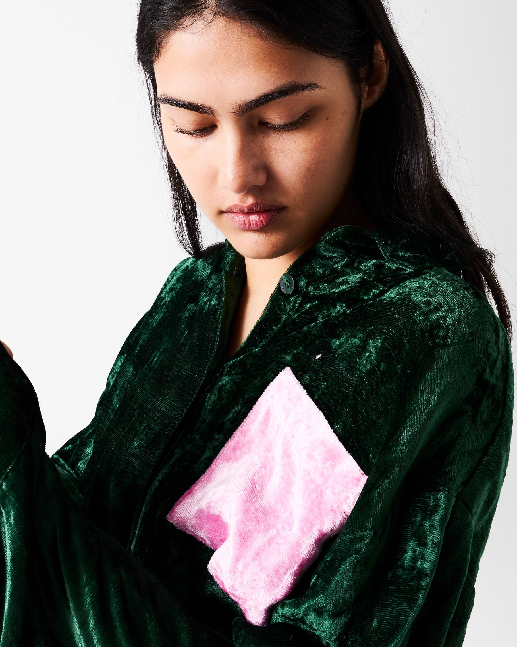 Close-up detail of pink pocket on Candy Pine Adult Velvet Long Sleeve Shirt by Kip Co