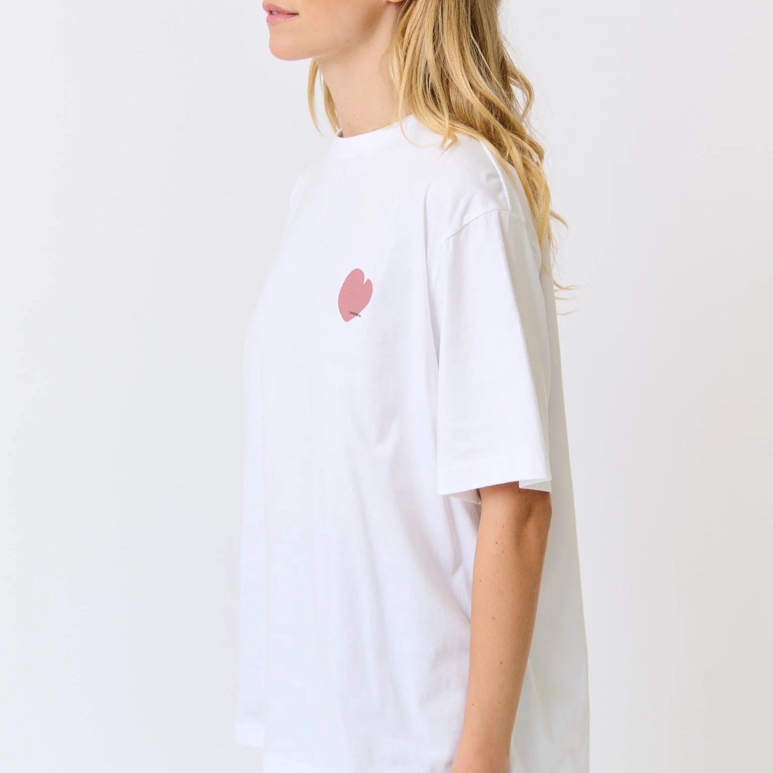 white t-shirt with small pink heart from C&W