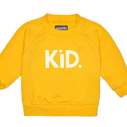 Yellow sweater with word kid on front