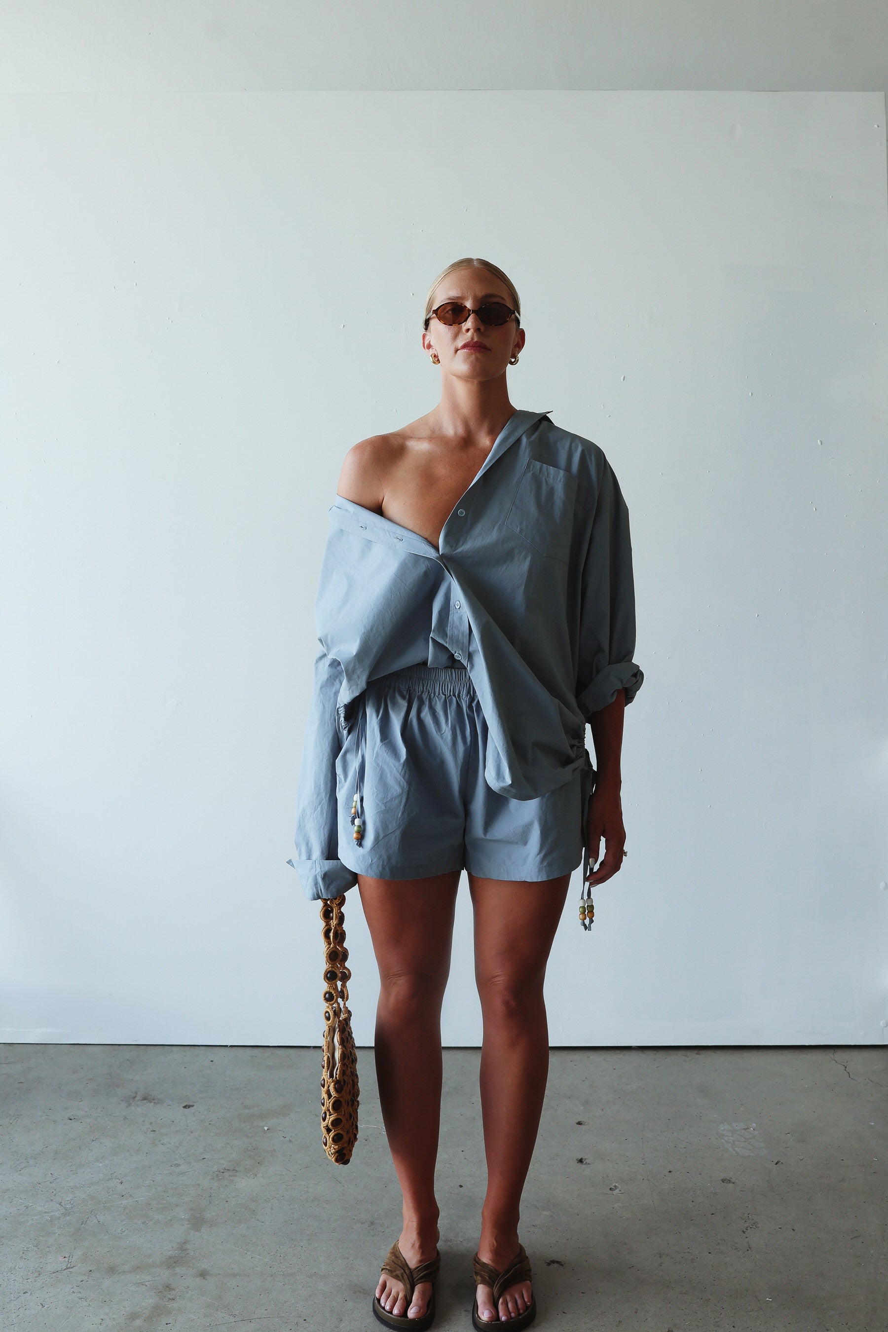 model wearing Chloe Cotton Short - Cornflower blue by By Billie