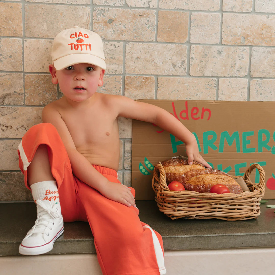 boy wearing Ciao Tutti Relaxed Pants Napoli Red by Golden Children