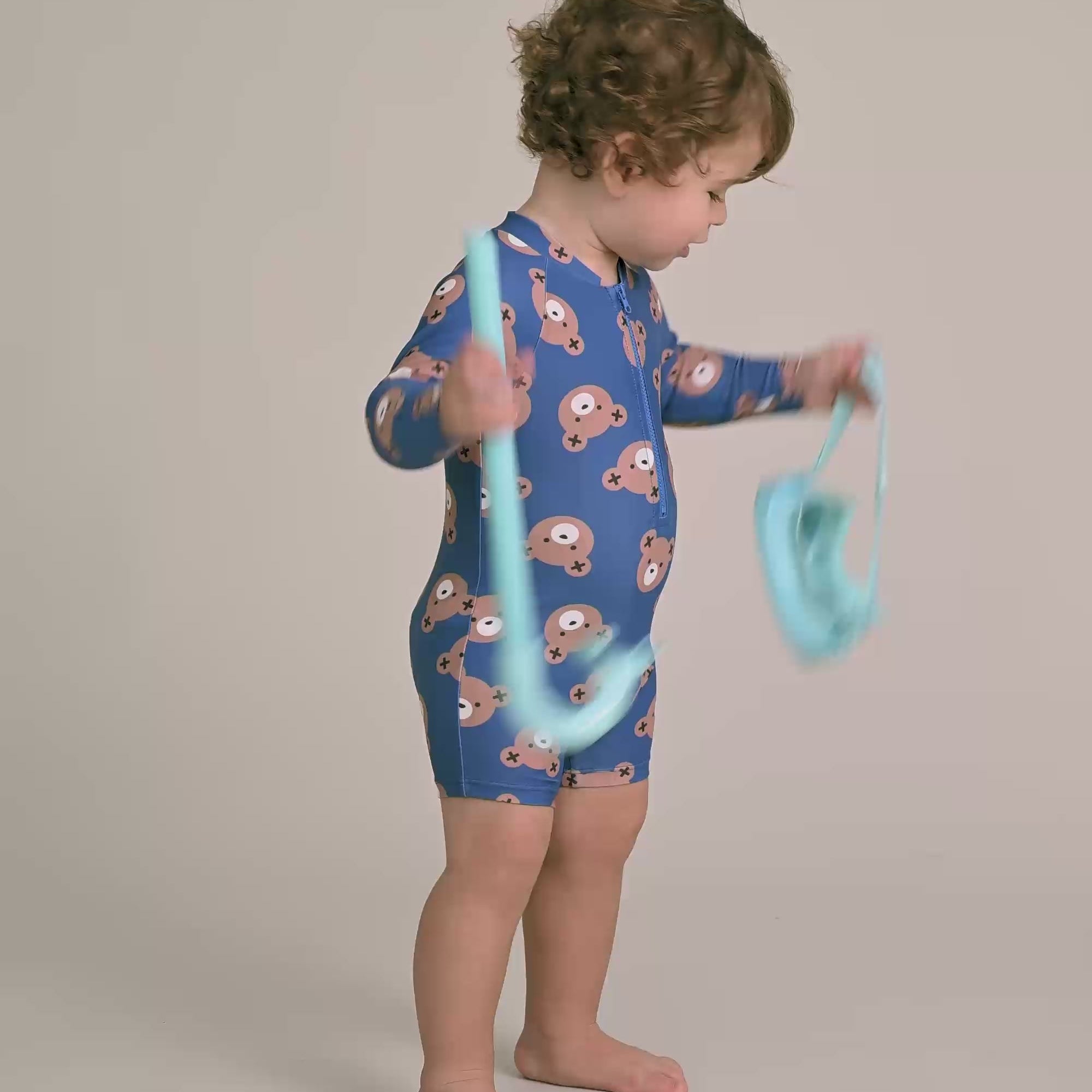 Child side view wearing Classic Hux Rashie | Huxbaby