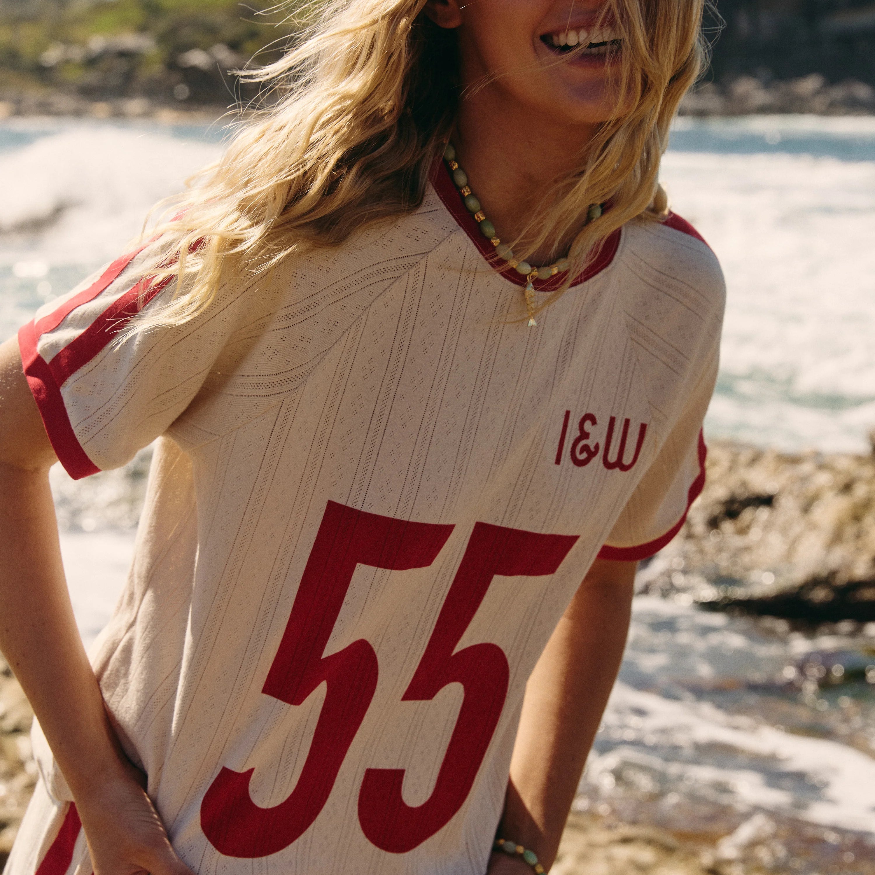 women's tshirt - cream with red "55" and "I&W" print arcross the front