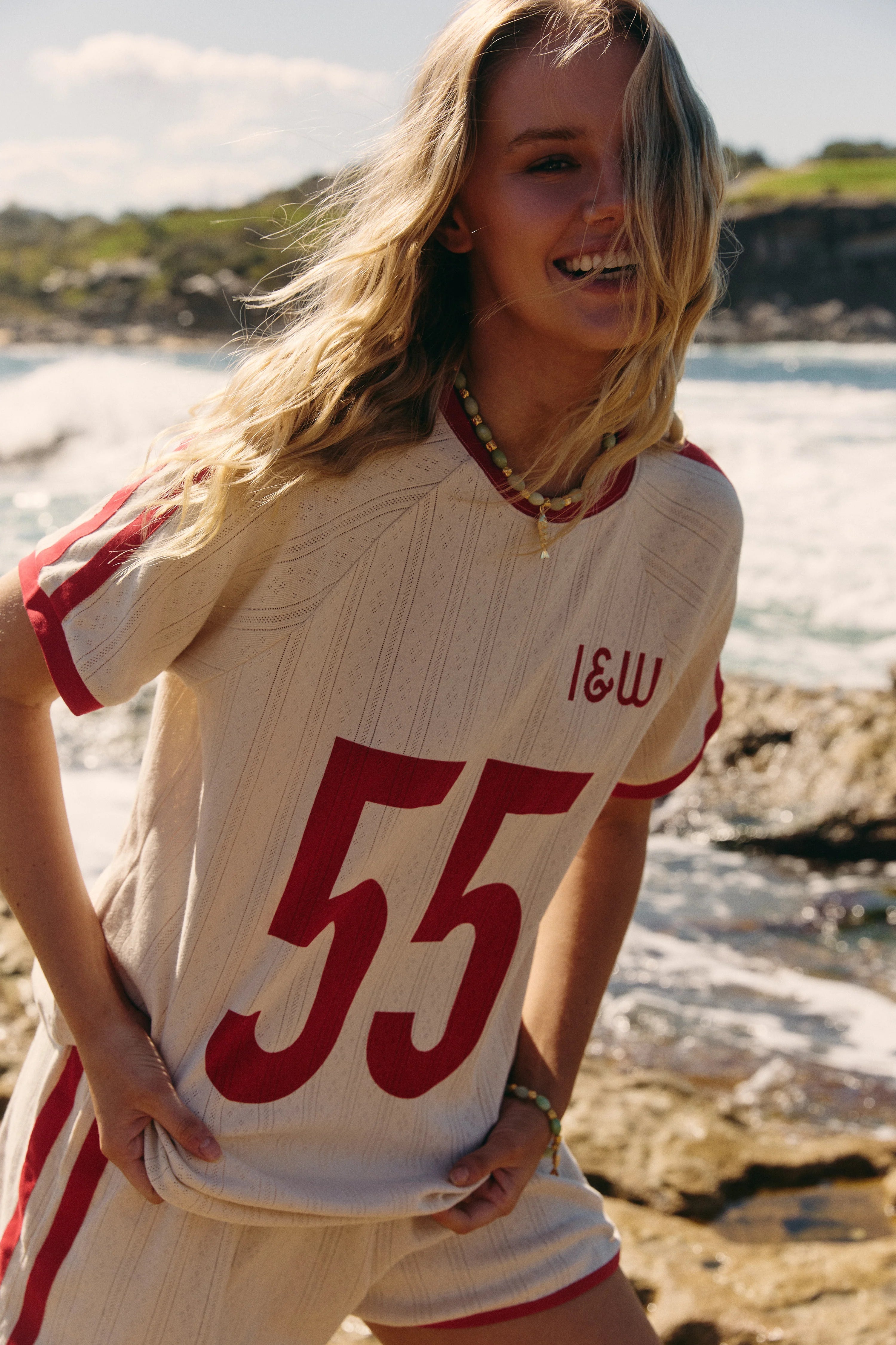 women's tshirt - cream with red "55" and "I&W" print arcross the front