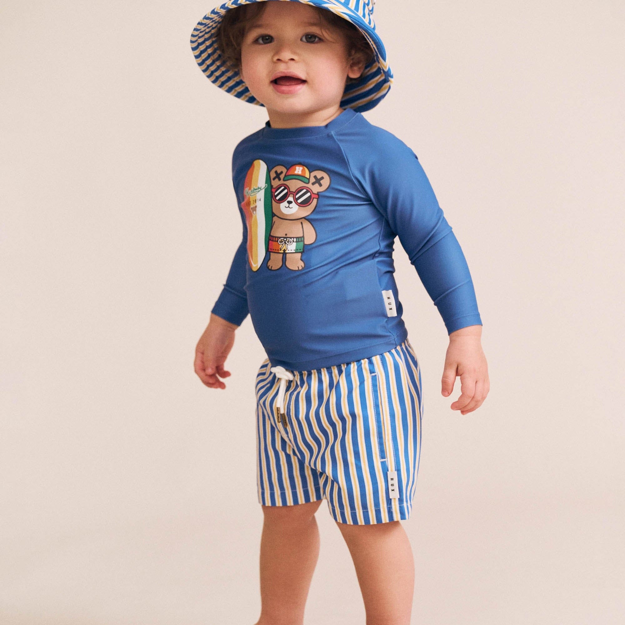 Side view of Collegiate Stripe Boardshort | Huxbaby
