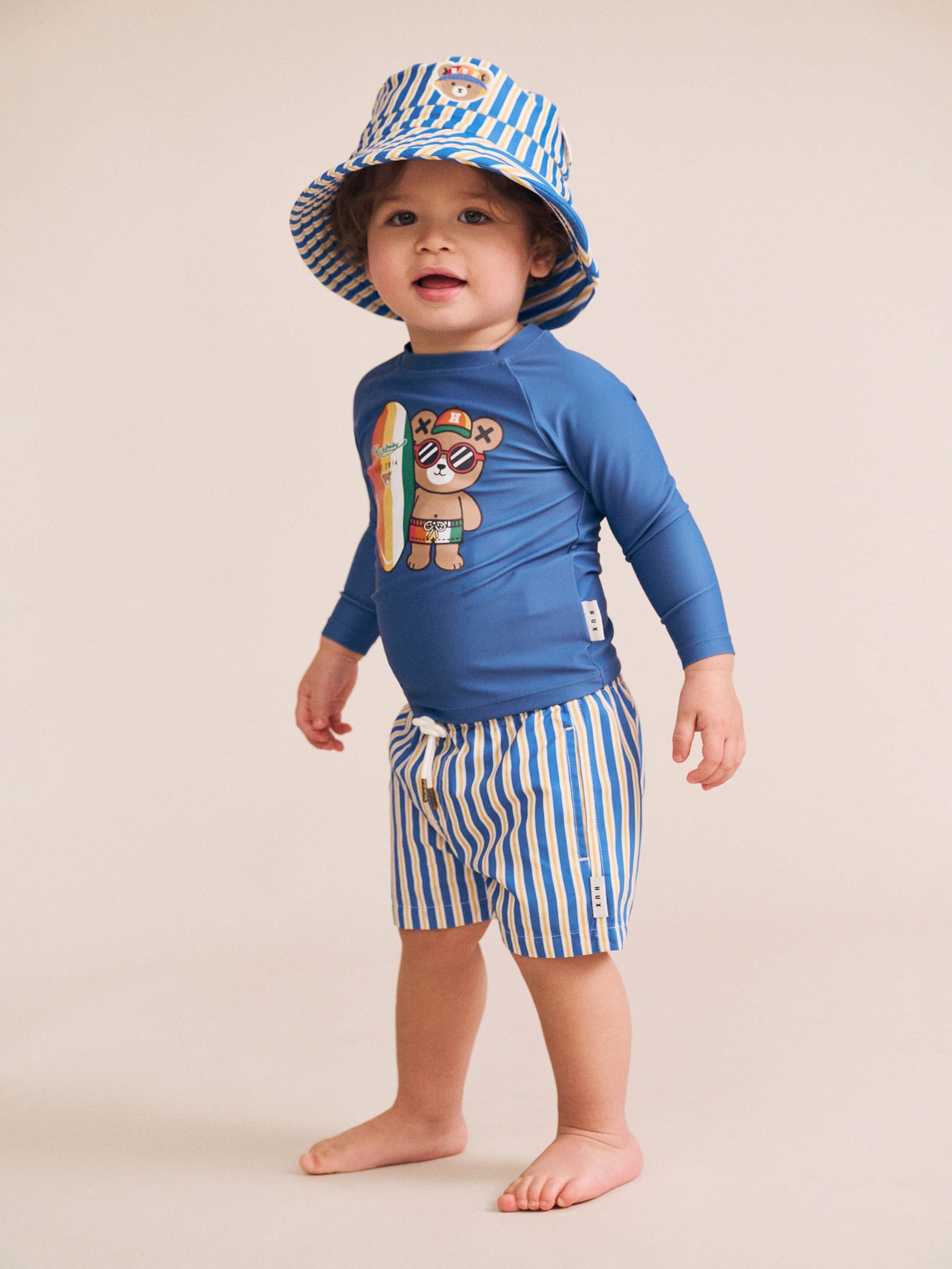 Side view of Collegiate Stripe Boardshort | Huxbaby