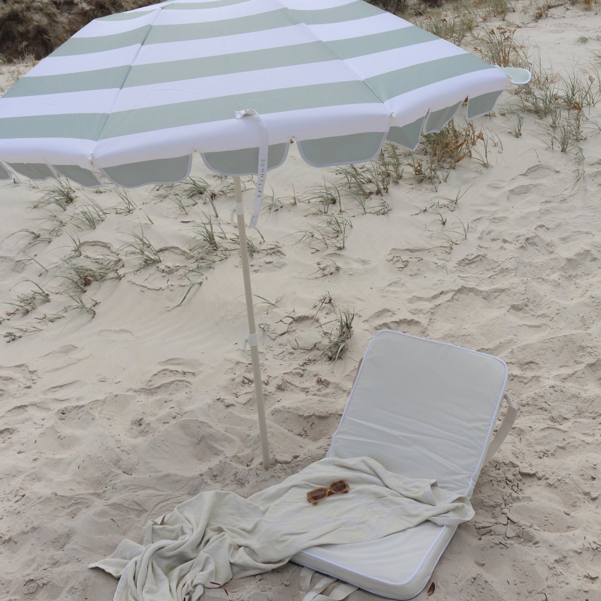 UPF50 polyester canopy fabric texture in sea sage green color showing sun protection material quality