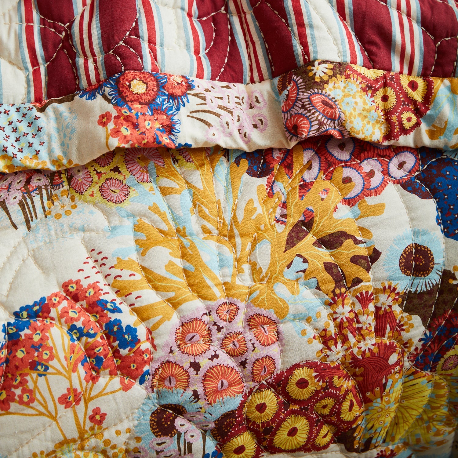 Sage & Clare Cora bedcover showing both sides of reversible design