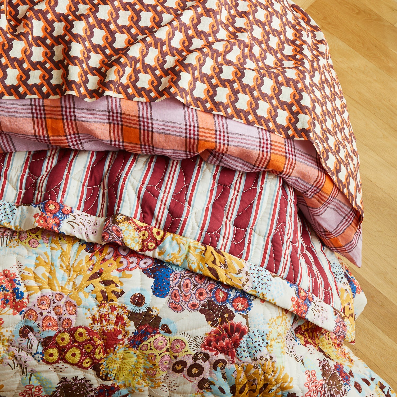 Folded Cora bedcover Pearl demonstrating soft cotton texture and thickness