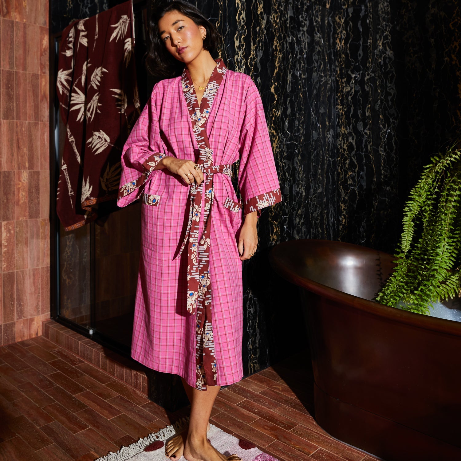 Model styling Cosmin Cotton Robe with belt showcasing comfortable loungewear design and wide sleeve construction