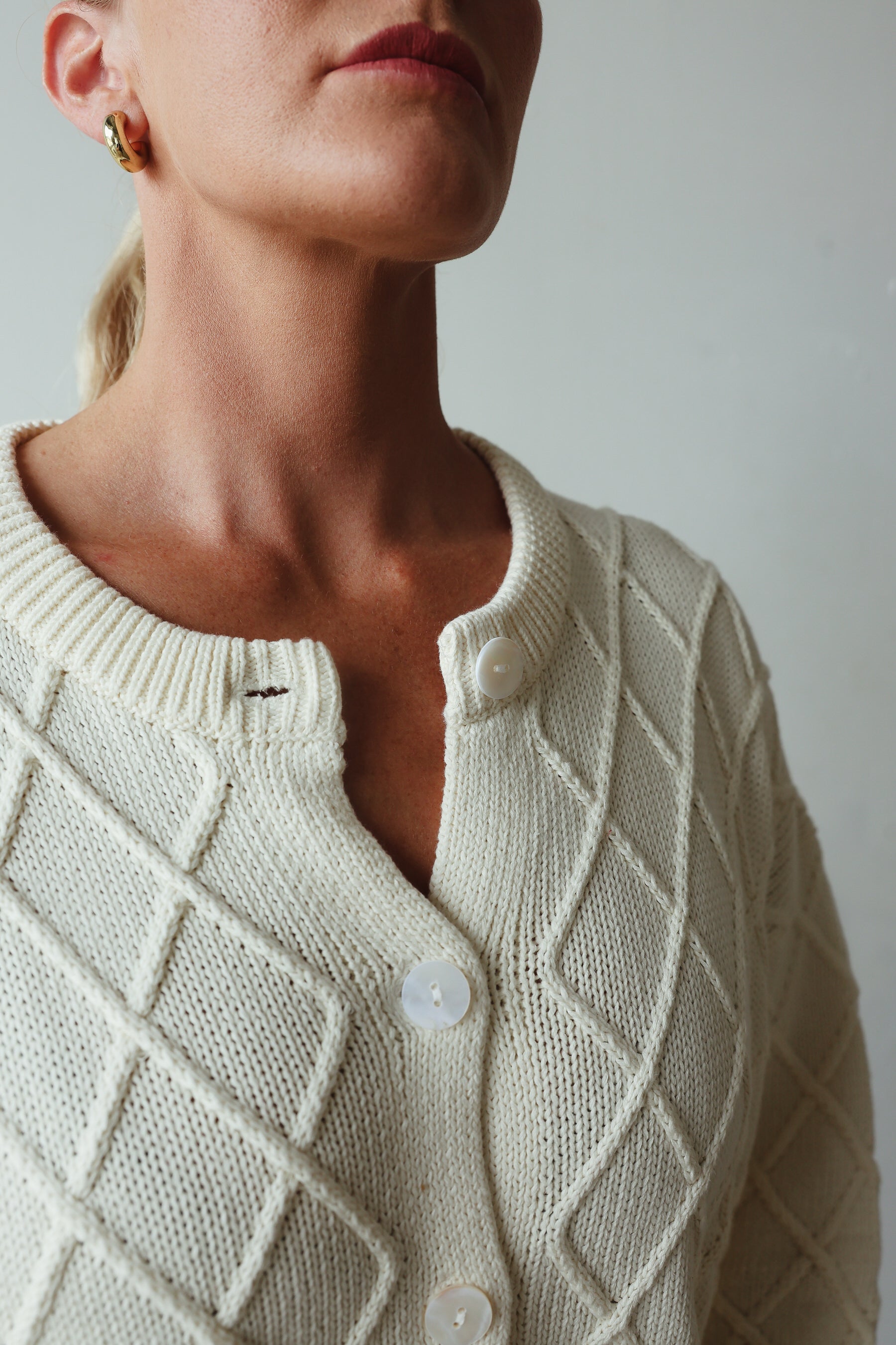 neckline details of Crochet Knit Cardigan - cream by By Billie