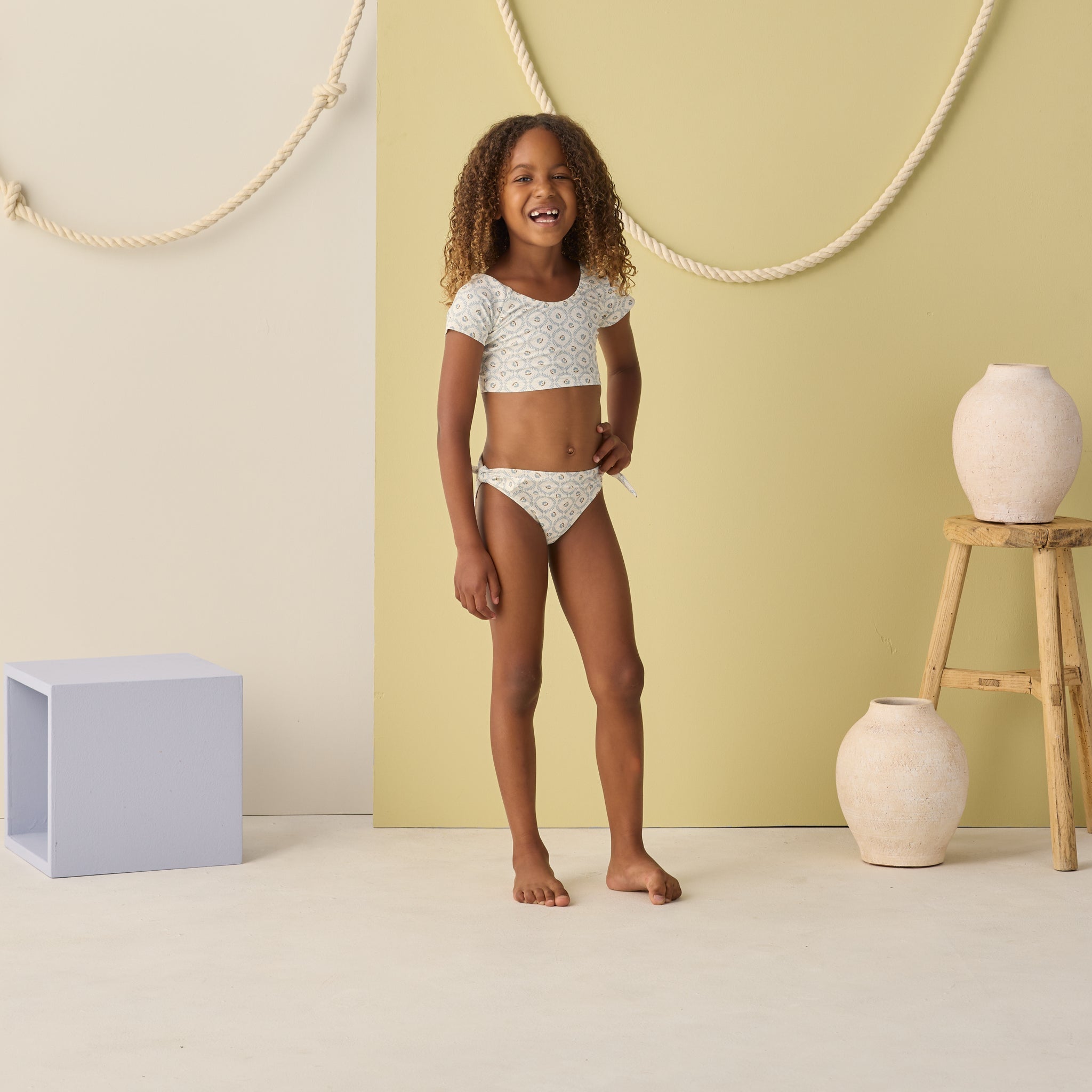 Girl wearing Cropped Rashguard Set Green Fleur | Rylee + Cru
