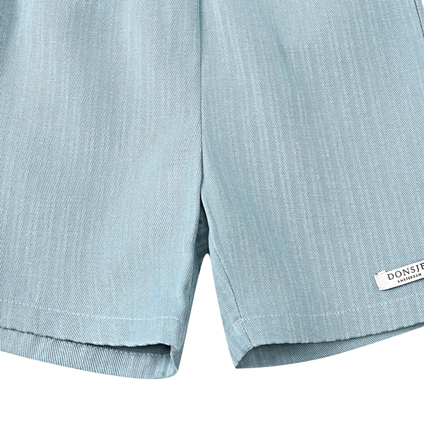 Close up of front on the Cyriel Shorts - Steel Blue Striped | Donsje