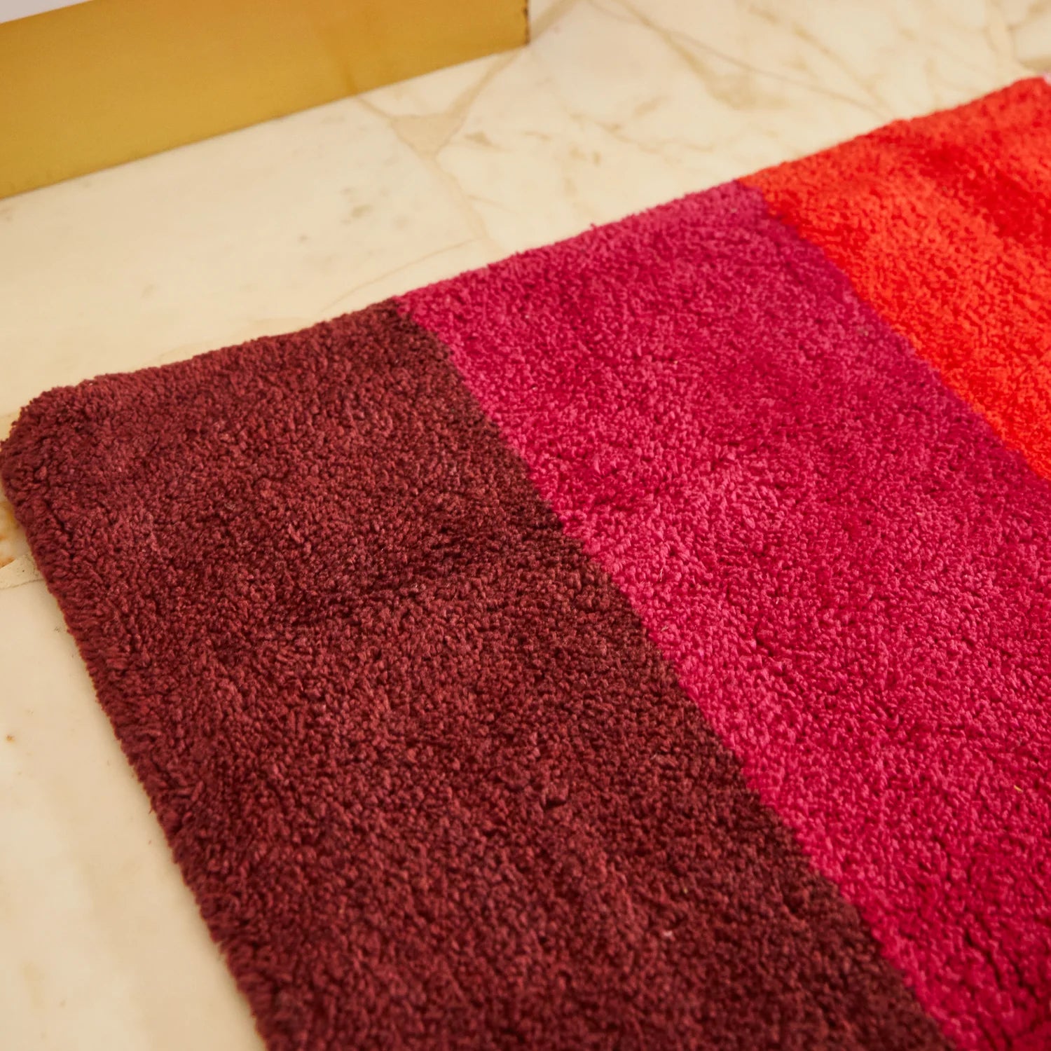 fabric detail of Dariel Nudie Bath Mat – Scarlet by Sage & Clare